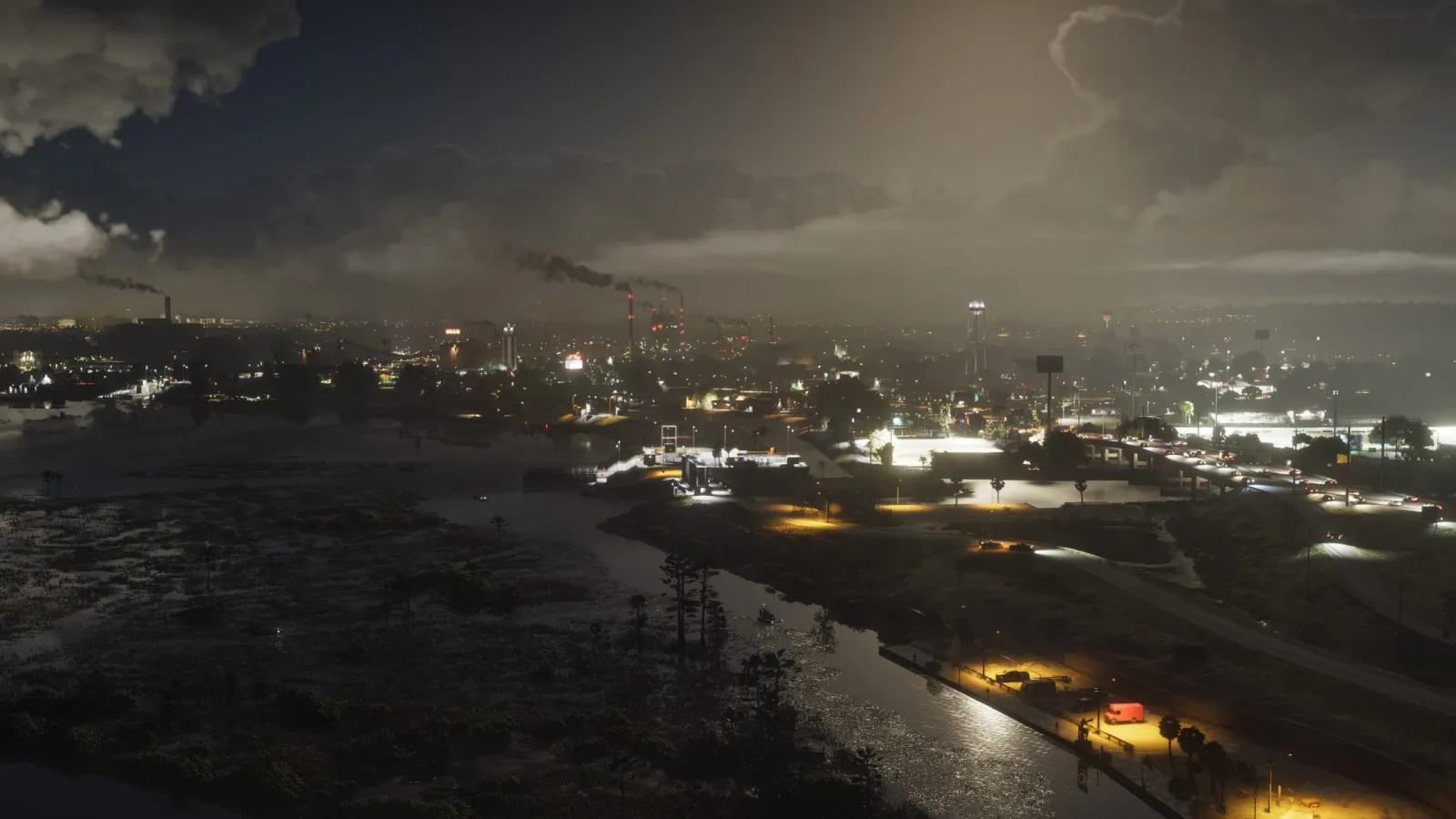 Une ville de Leonida en activité la nuit dans GTA 6, cheminées, marais et autoroutes éclairées.